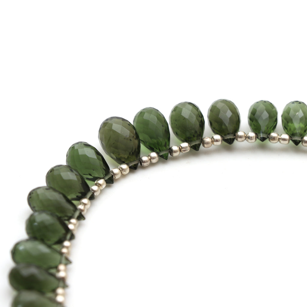 Natural Moldavite Faceted Drop Beads, 6.5x10.5 mm to 8x13.5 mm, Moldavite Drop Jewelry Making Beads, 4.5 Inch Full Strand, Price Per Strand - National Facets, Gemstone Manufacturer, Natural Gemstones, Gemstone Beads, Gemstone Carvings
