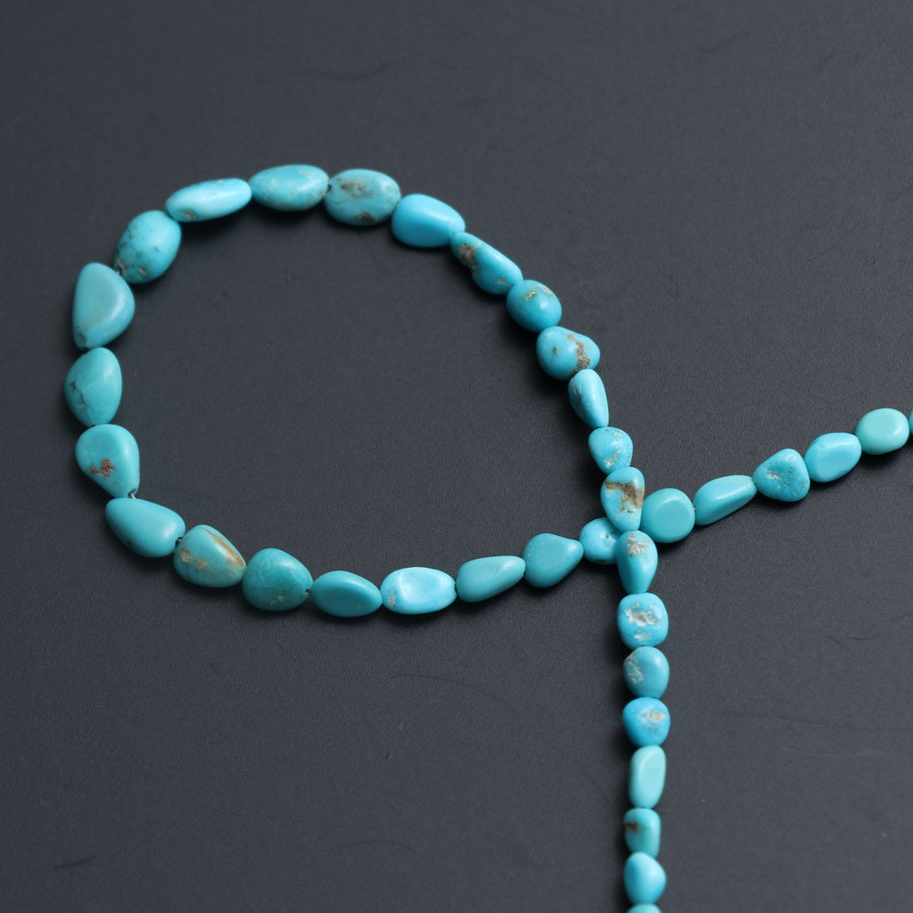 Turquoise Smooth Nuggets Beads, Turquoise nuggets - 4x3 mm to 5x7.5 mm - Turquoise Nuggets - Gem Quality, 8 Inch, Price Per Strand - National Facets, Gemstone Manufacturer, Natural Gemstones, Gemstone Beads