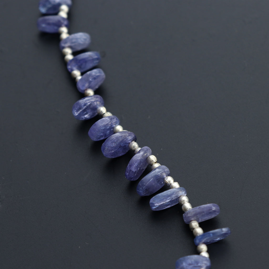 Natural Tanzanite Smooth Flat Oval Beads - 5x6 mm to 7x9 mm- Tanzanite Oval Cabs Gemstone- Gem Quality , 20 Cm Full Strand, Price Per Strand - National Facets, Gemstone Manufacturer, Natural Gemstones, Gemstone Beads