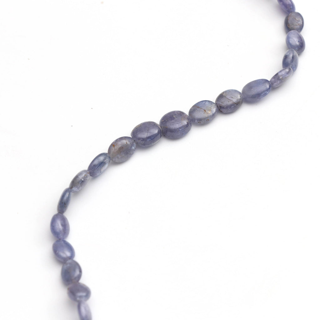Natural Tanzanite Smooth Oval Beads, Tanzanite Oval, 6x7 mm to 7.5x9 mm - Tanzanite - Gem Quality , 8 Inch Full Strand, Price Per Strand - National Facets, Gemstone Manufacturer, Natural Gemstones, Gemstone Beads