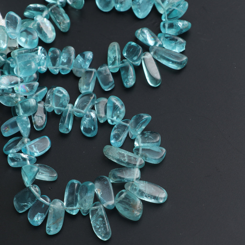 Sky Apatite Smooth Pabbles Beads - 5x8 mm to 8x14 mm - Sky Apatite Gemstone - Gem Quality , 18 Cm Full Strand, Price Per Strand - National Facets, Gemstone Manufacturer, Natural Gemstones, Gemstone Beads