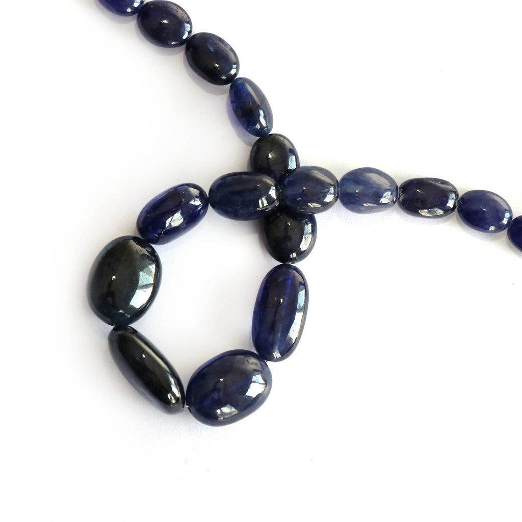 Blue Sapphire Smooth Tumble Glass Filled, Sapphire Tumble- 9x7 mm to 18x13 mm-Blue Sapphire-Gem Quality, 8 Inch Full Strand,Price Per Strand - National Facets, Gemstone Manufacturer, Natural Gemstones, Gemstone Beads