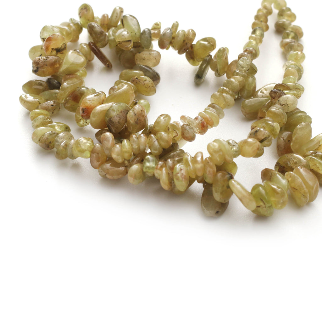 Sphene Smooth Nuggets, 2x2.5 mm to 7.5x10 mm, Sphene Smooth, Sphene Nuggets- Gem Quality, 8 Inch/ 20 Cm Full Strand, Price Per Strand - National Facets, Gemstone Manufacturer, Natural Gemstones, Gemstone Beads