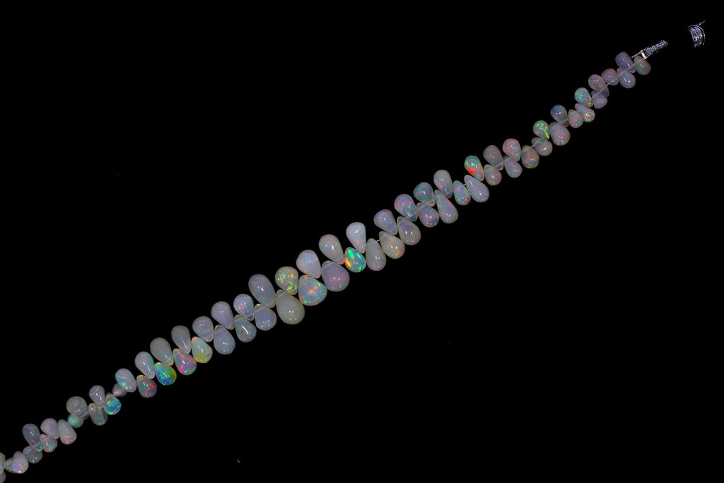 Ethiopian Opal Smooth Drops, Ethiopain Opal Drop Shape, Ethiopian Opal Tear Drops 4 to 10 mm | 18 Inch Strand - National Facets, Gemstone Manufacturer, Natural Gemstones, Gemstone Beads