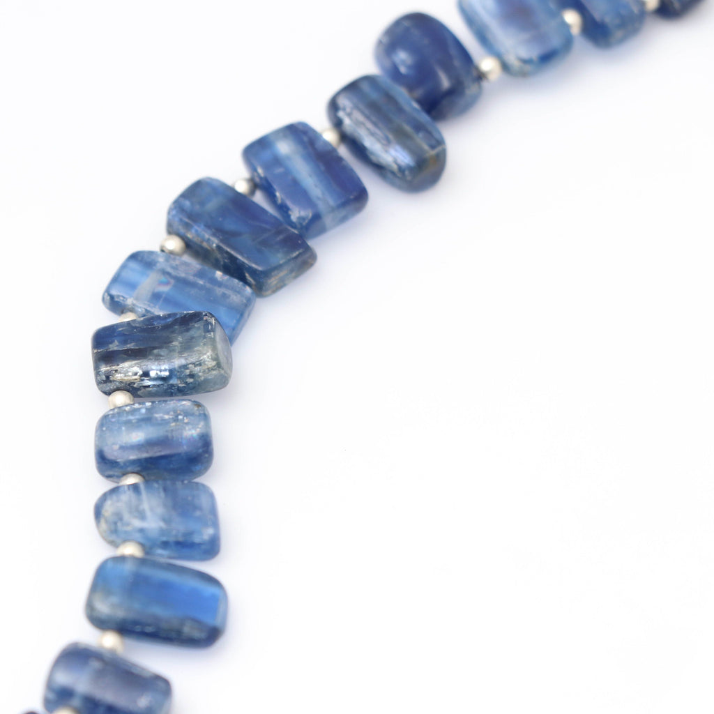 Kyanite Smooth Slice Side Drill Beads , Kyanite Side Drill -8x5 mm to 14x8 mm - Kyanite Smooth Slice -Gem Quality, 8 Inch, Price Per Strand - National Facets, Gemstone Manufacturer, Natural Gemstones, Gemstone Beads
