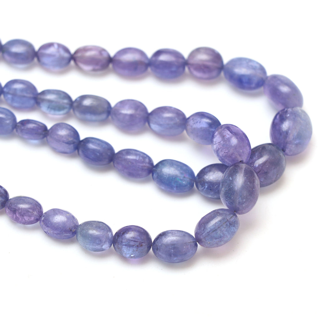 Natural Tanzanite Smooth Tumble Beads | 5x6.5 mm to 9x12 mm | Tanzanite Tumble Gemstone | 8 Inch/ 18 Inch Full Strand | Price Per Strand - National Facets, Gemstone Manufacturer, Natural Gemstones, Gemstone Beads