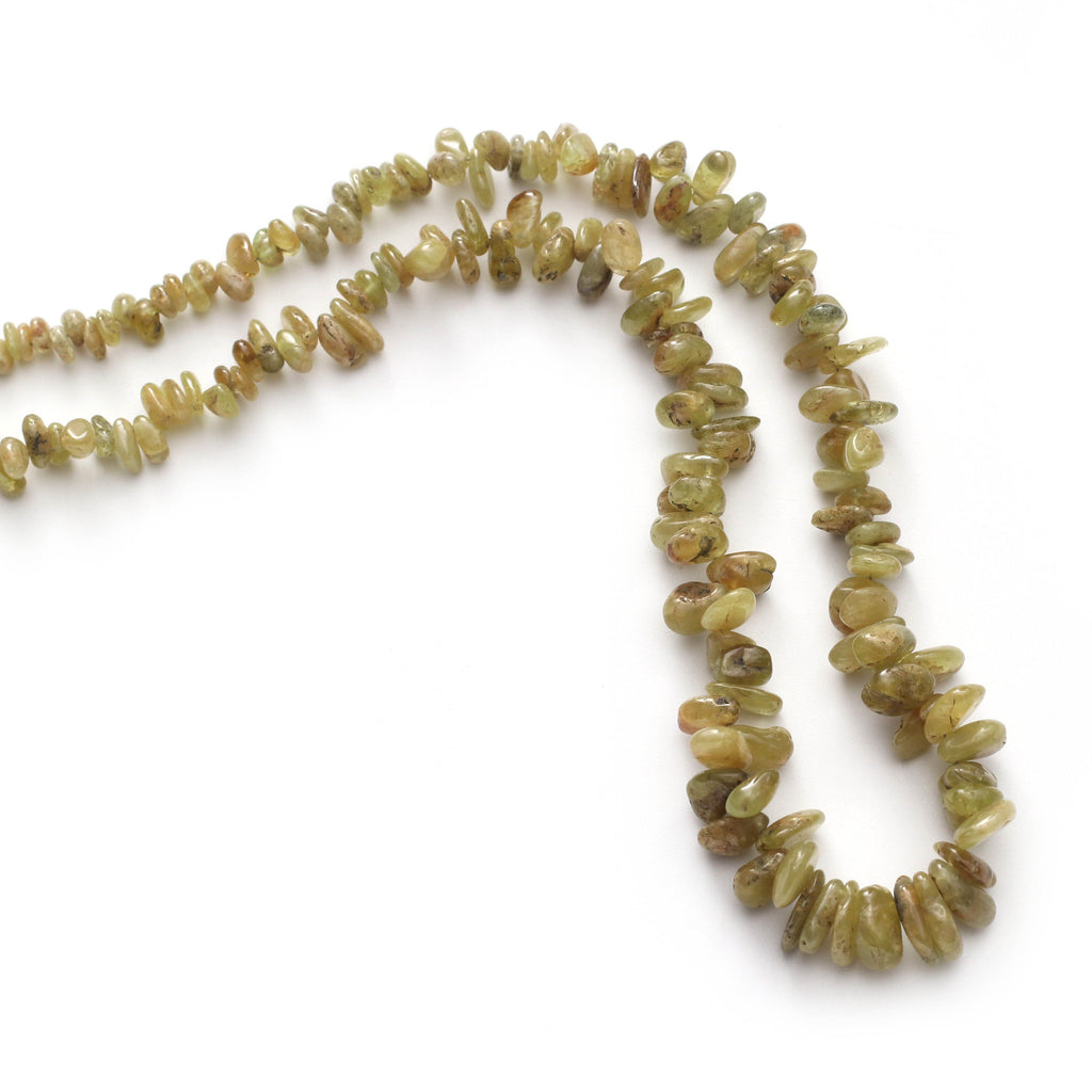 Sphene Smooth Nuggets, 2x2.5 mm to 7.5x10 mm, Sphene Smooth, Sphene Nuggets- Gem Quality, 8 Inch/ 20 Cm Full Strand, Price Per Strand - National Facets, Gemstone Manufacturer, Natural Gemstones, Gemstone Beads