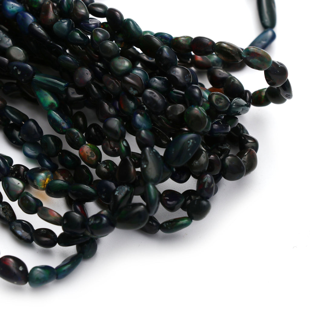 Black Opal Smooth Oval Tumble Beads, 6x3 mm to 7x6 mm Black Opal Tumble- Gem Quality , 8 Inch/ 46 Cm Full Strand, Price Per Strand - National Facets, Gemstone Manufacturer, Natural Gemstones, Gemstone Beads