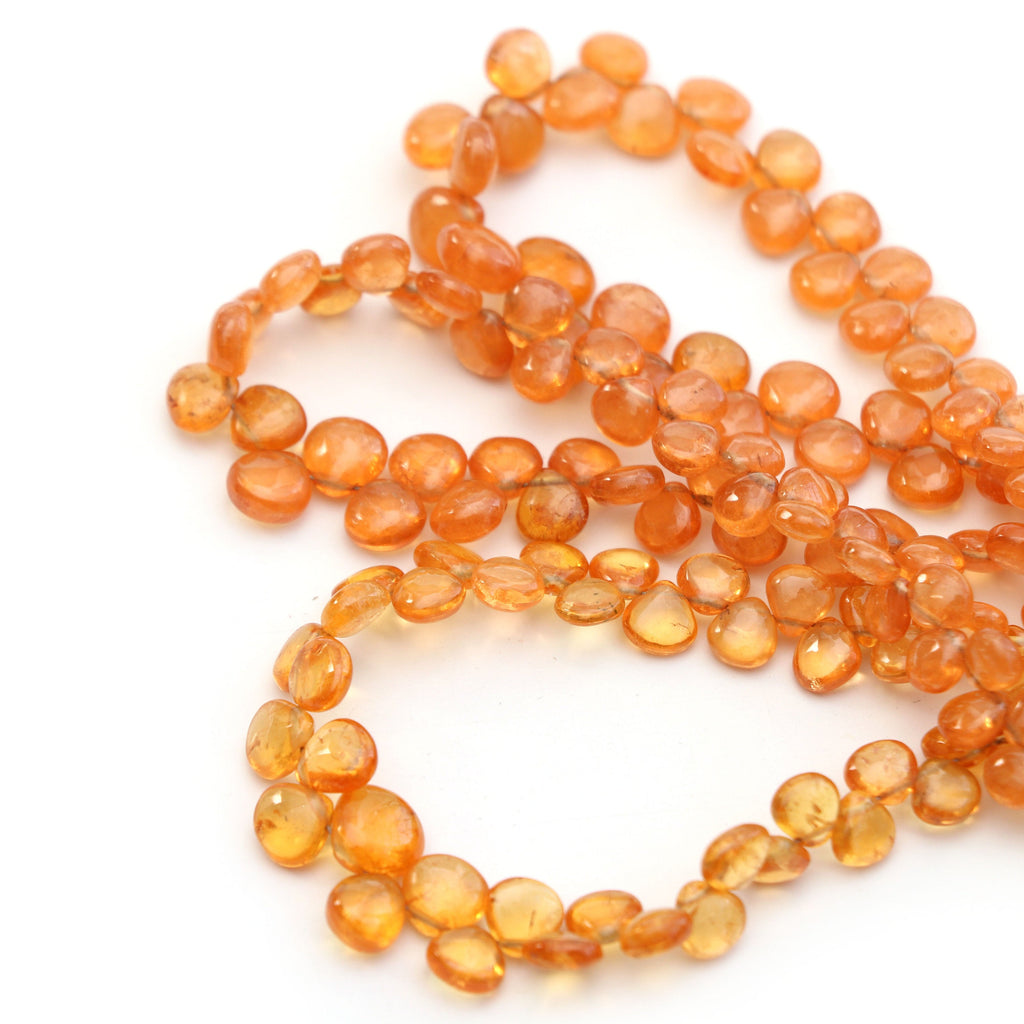 Spessartite Smooth Heart Beads- 4.5mm to 7.5mm Spessartite Heart Beads - Gem Quality, 8 Inch/16 Inch Full Strand, Price Per Strand - National Facets, Gemstone Manufacturer, Natural Gemstones, Gemstone Beads