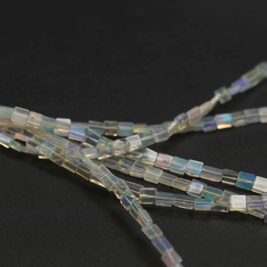Natural Ethiopian Opal Smooth Rectangle Beads | 3x4 mm to 4x8 mm | 8 Inches/ 18 Inches Full Strand | Price Per Strand - National Facets, Gemstone Manufacturer, Natural Gemstones, Gemstone Beads