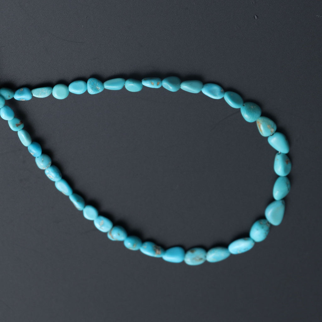 Turquoise Smooth Nuggets Beads, Turquoise nuggets - 4x3 mm to 5x7.5 mm - Turquoise Nuggets - Gem Quality, 8 Inch, Price Per Strand - National Facets, Gemstone Manufacturer, Natural Gemstones, Gemstone Beads