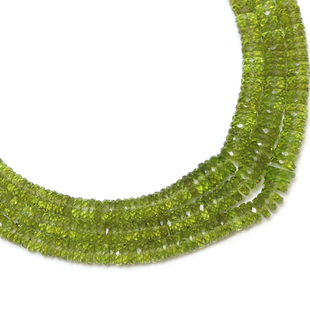 Natural Peridot Faceted Tyre Shape Beads | 4.5 mm to 7 mm | Peridot Wheel Shape Beads | 8 Inch/ 16 Inch Full Strand | Price Per Strand - National Facets, Gemstone Manufacturer, Natural Gemstones, Gemstone Beads