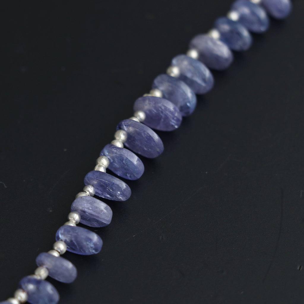 Natural Tanzanite Smooth Flat Oval Beads - 5x6 mm to 7x9 mm- Tanzanite Oval Cabs Gemstone- Gem Quality , 20 Cm Full Strand, Price Per Strand - National Facets, Gemstone Manufacturer, Natural Gemstones, Gemstone Beads