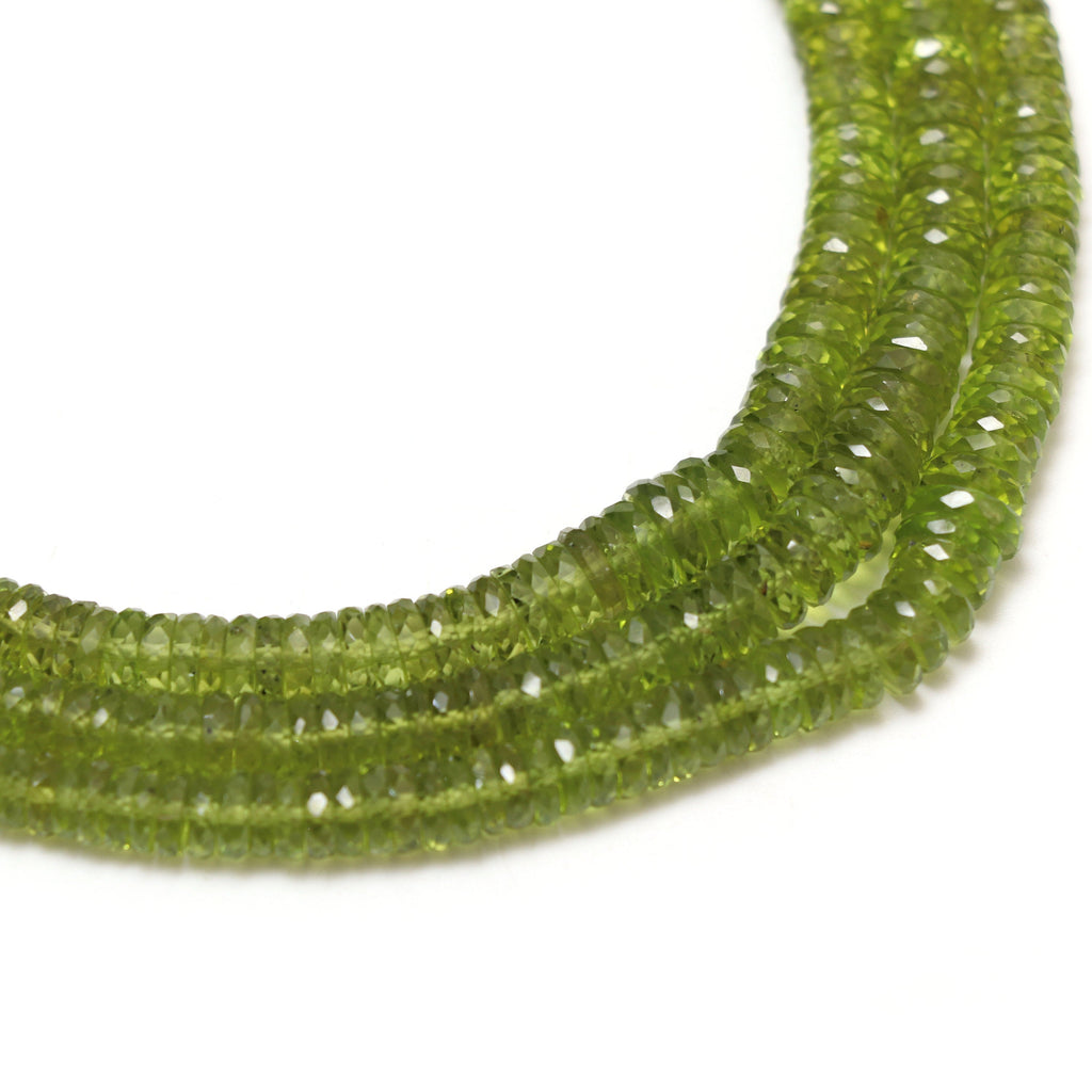 Natural Peridot Faceted Tyre Shape Beads | 4.5 mm to 7 mm | Peridot Wheel Shape Beads | 8 Inch/ 16 Inch Full Strand | Price Per Strand - National Facets, Gemstone Manufacturer, Natural Gemstones, Gemstone Beads