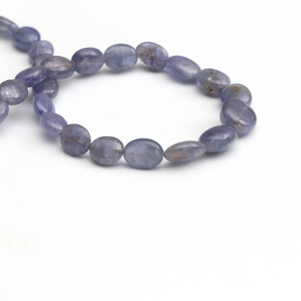 Natural Tanzanite Smooth Oval Beads, Tanzanite Oval, 6x7 mm to 7.5x9 mm - Tanzanite - Gem Quality , 8 Inch Full Strand, Price Per Strand - National Facets, Gemstone Manufacturer, Natural Gemstones, Gemstone Beads