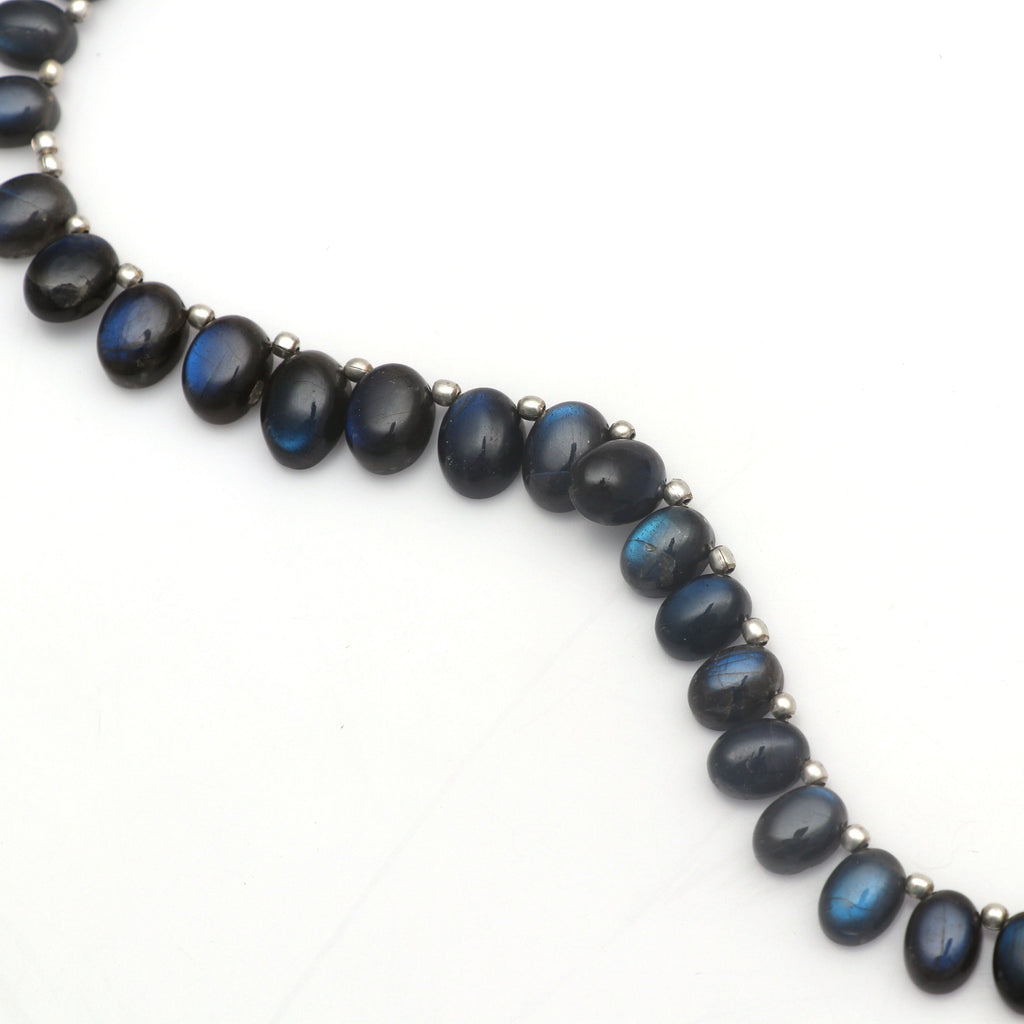 Labradorite Smooth Oval Beads - 5x7 mm to 7x10 mm- Labradorite Blue Flash Graduation Oval - Gem Quality ,16 Cm Full Strand, Price Per Strand - National Facets, Gemstone Manufacturer, Natural Gemstones, Gemstone Beads