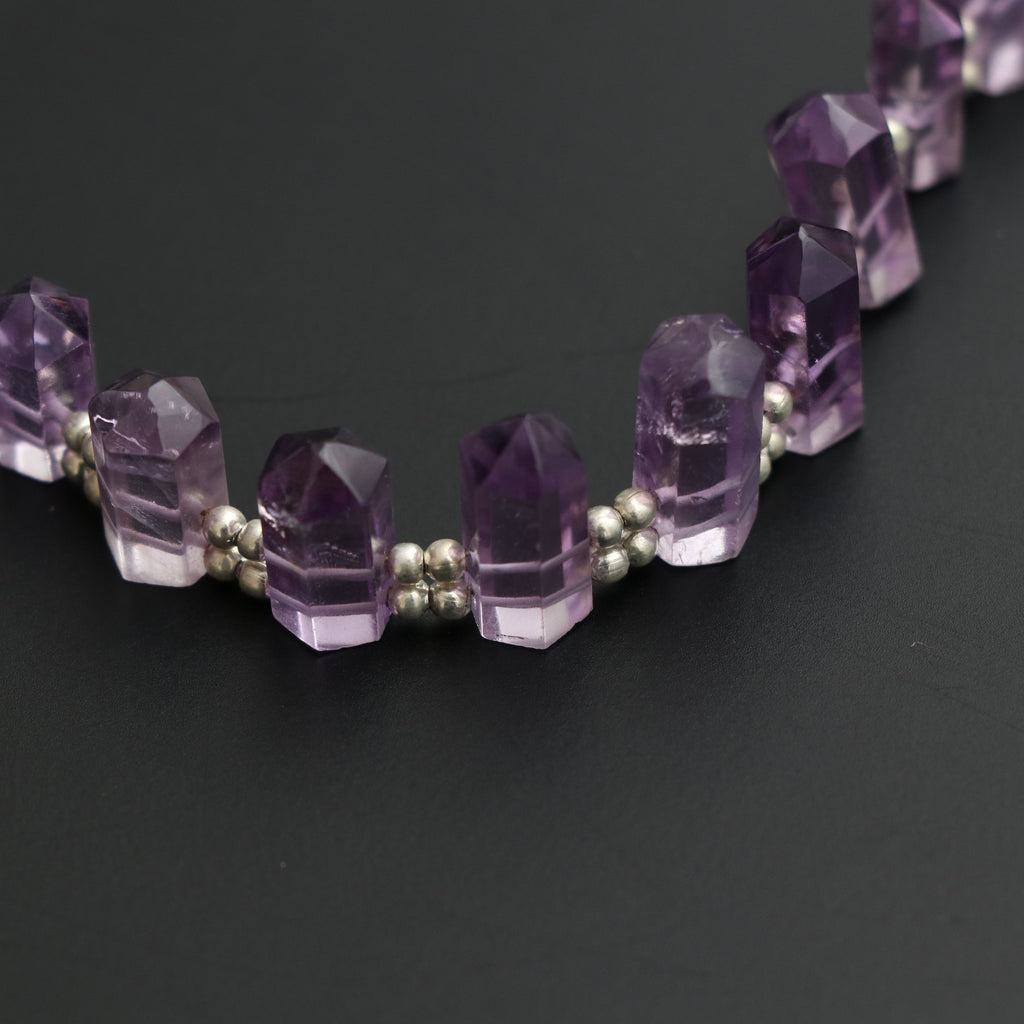 Amethyst Faceted Cut Gemstone Bullet Beads, 5x9 mm to 6x16 mm, Amethyst Bullet Point, Amethyst Cut, 8 Inch, Price Per Strand - National Facets, Gemstone Manufacturer, Natural Gemstones, Gemstone Beads