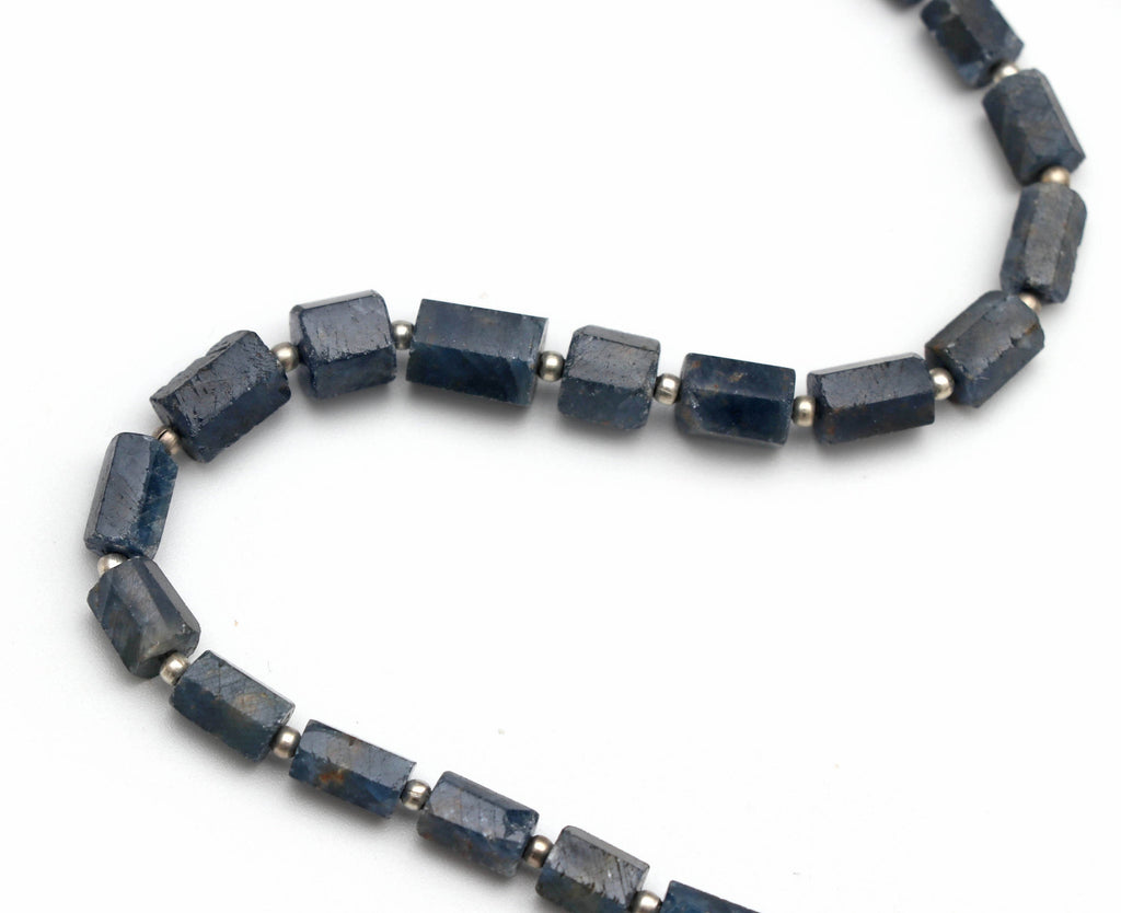 Blue Sapphire Faceted Cylinder Beads - 4x6 mm to 6x9 mm - Blue Sapphire Beads - Gem Quality , 8 Inch/ 20 Cm Full Strand, Price Per Strand - National Facets, Gemstone Manufacturer, Natural Gemstones, Gemstone Beads