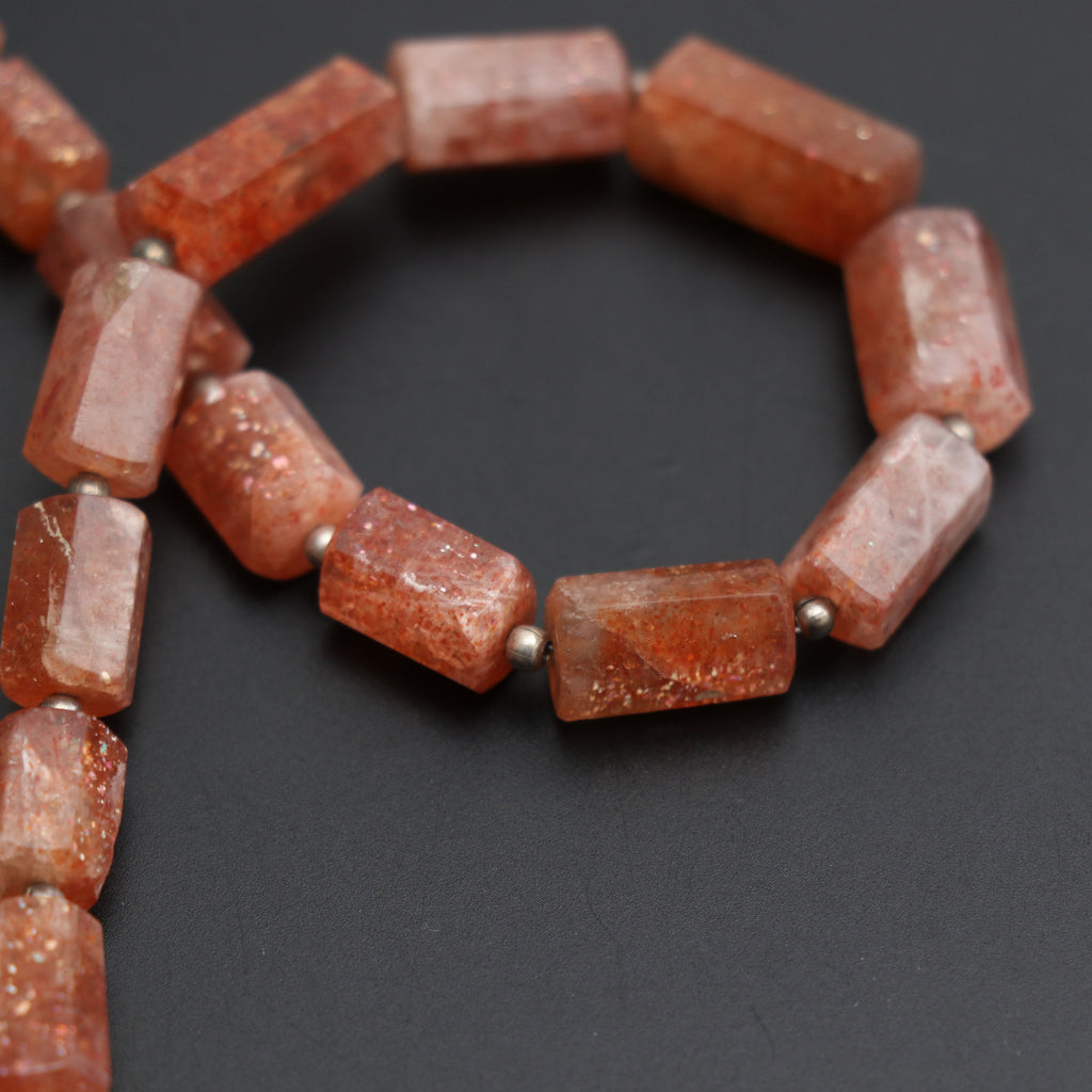 Sunstone Faceted Beads Cylinder, Sunstone Faceted - 7x5 mm to 14x8 mm -Sunstone Cylinder - Gem Quality, 8 Inch, Price Per Strand - National Facets, Gemstone Manufacturer, Natural Gemstones, Gemstone Beads