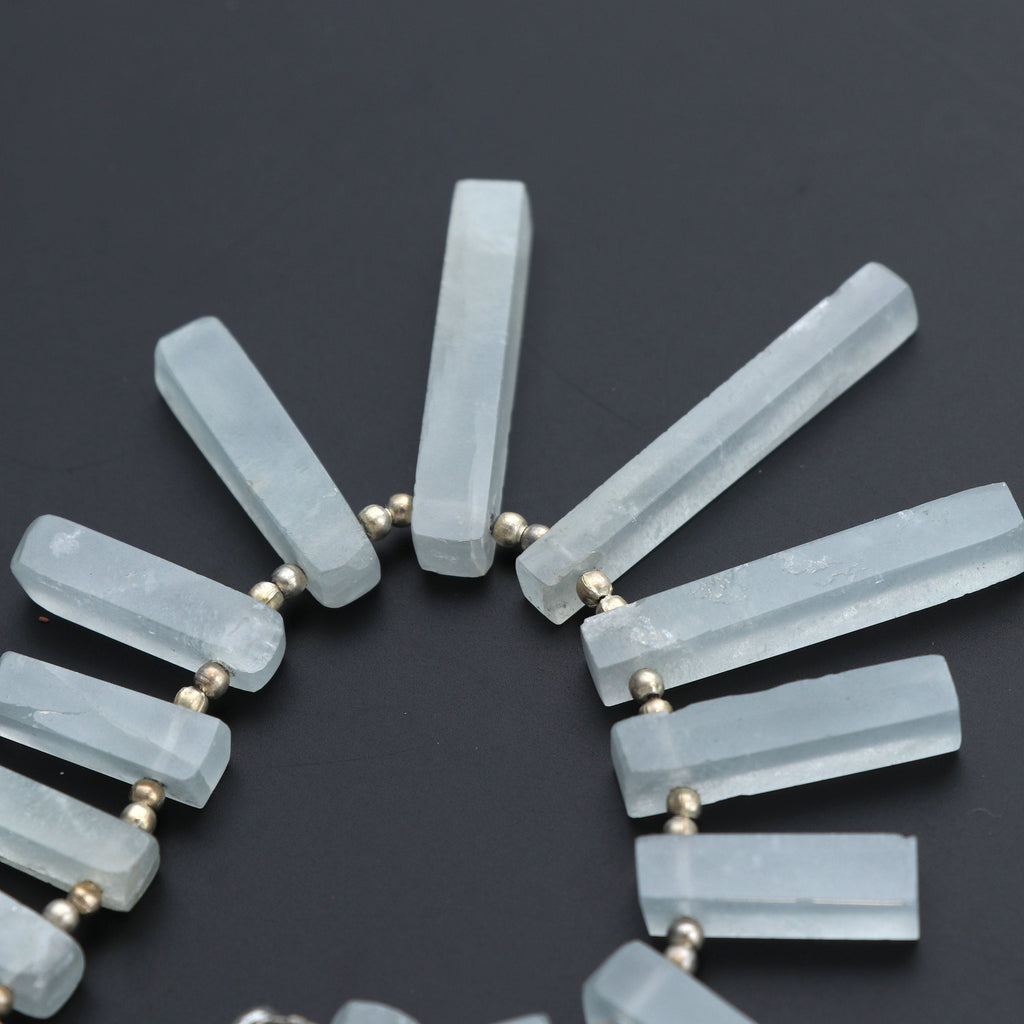 Natural Aquamarine Smooth Long Slice, 5x14 mm to 5x25 mm, Aquamarine Smooth, Aquamarine Long Slice, 5 Inch Full Strand, price per strand - National Facets, Gemstone Manufacturer, Natural Gemstones, Gemstone Beads