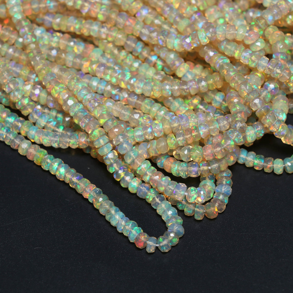 Natural Ethiopian Opal Faceted Roundell Beads, White Fire Opal , 3.5 mm to 4 mm - Ethiopian Opal - 8 Inch / 16 Inches, Price Per Strand - National Facets, Gemstone Manufacturer, Natural Gemstones, Gemstone Beads