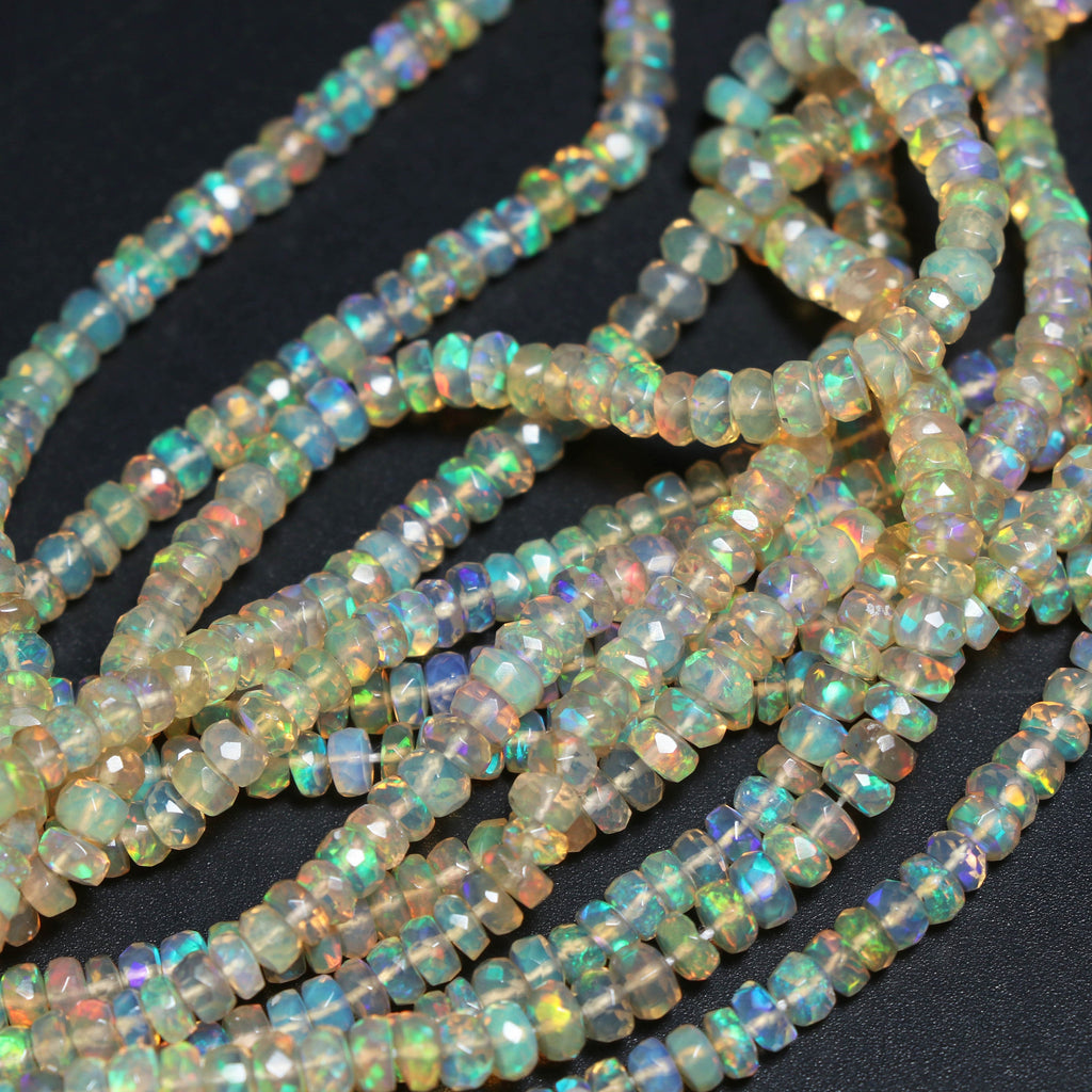 Natural Ethiopian Opal Faceted Roundell Beads, White Fire Opal , 3.5 mm to 4 mm - Ethiopian Opal - 8 Inch / 16 Inches, Price Per Strand - National Facets, Gemstone Manufacturer, Natural Gemstones, Gemstone Beads