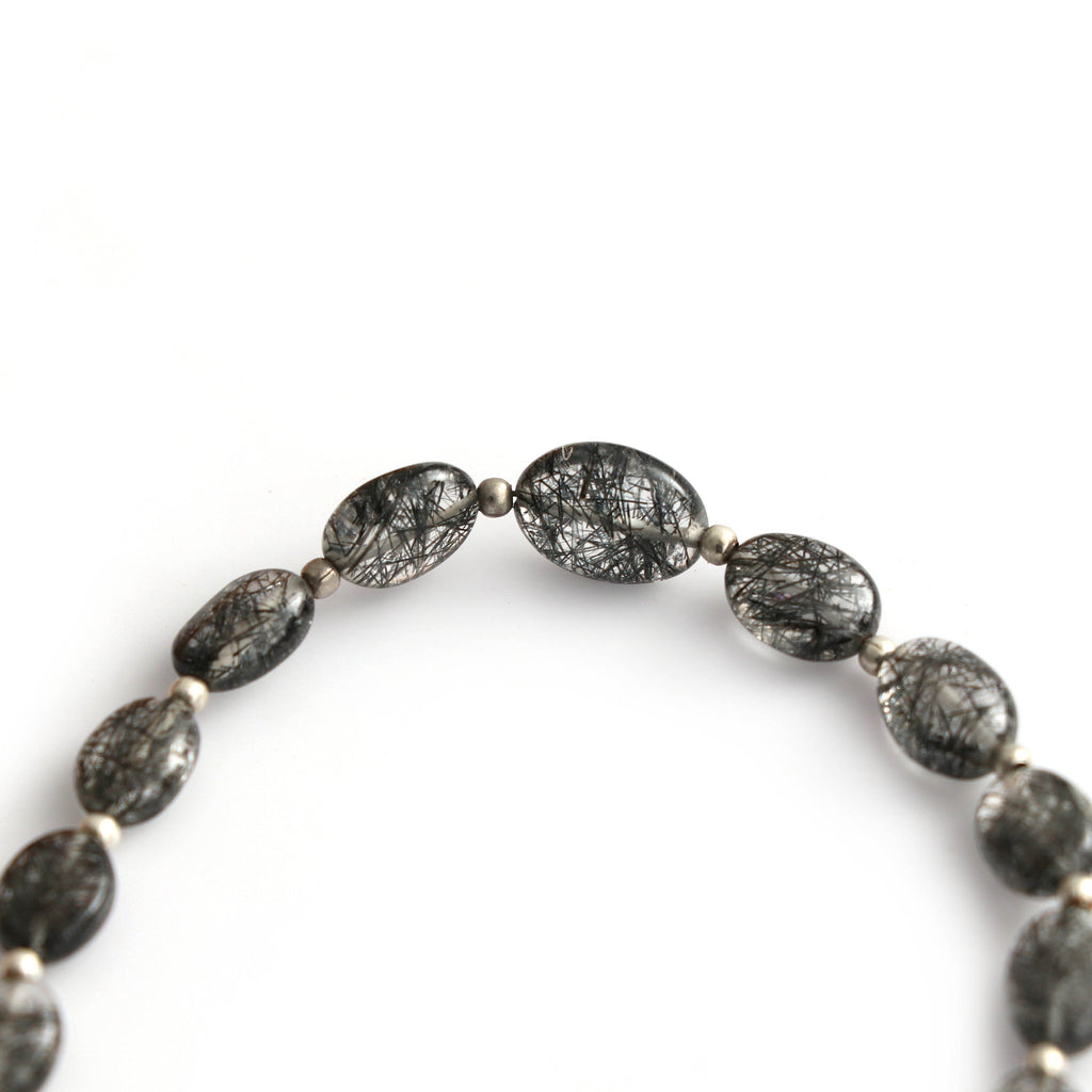 Black Rutile Smooth Oval Beads - 6x8 mm to 8x11 mm -Black Rutile Cabochon - Gem Quality , 8 Inch / 20 Cm Full Strand, Price Per Strand - National Facets, Gemstone Manufacturer, Natural Gemstones, Gemstone Beads