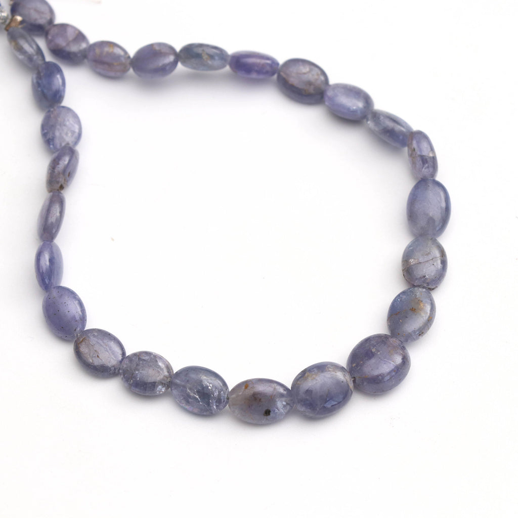 Natural Tanzanite Smooth Oval Beads, Tanzanite Oval, 6x7 mm to 7.5x9 mm - Tanzanite - Gem Quality , 8 Inch Full Strand, Price Per Strand - National Facets, Gemstone Manufacturer, Natural Gemstones, Gemstone Beads