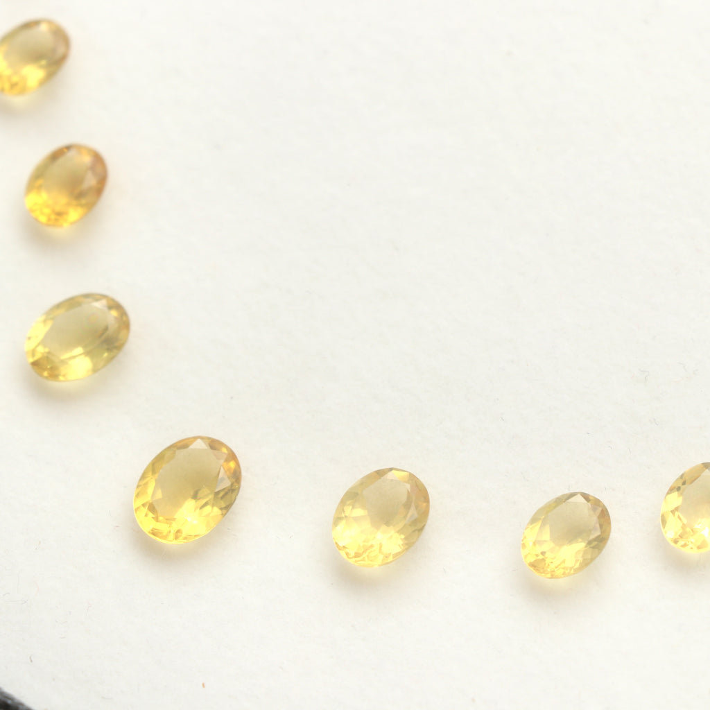 Natural Yellow Aquamarine Faceted Oval Loose Gemstone Layout, 5x7 mm to 9x11 mm, Aquamarine Oval Jewelry Making Gemstone, Set Of 21 Pieces - National Facets, Gemstone Manufacturer, Natural Gemstones, Gemstone Beads, Gemstone Carvings