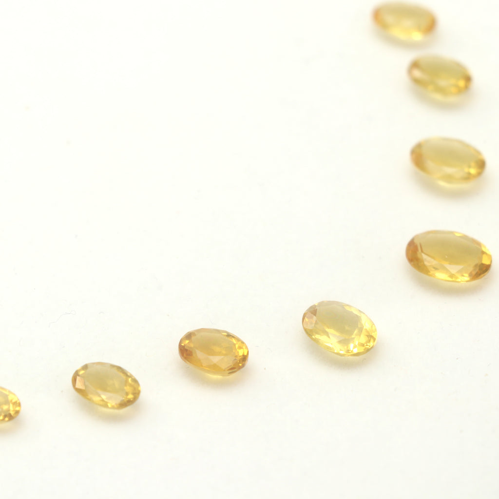 Natural Yellow Aquamarine Faceted Oval Loose Gemstone Layout, 5x7 mm to 9x11 mm, Aquamarine Oval Jewelry Making Gemstone, Set Of 21 Pieces - National Facets, Gemstone Manufacturer, Natural Gemstones, Gemstone Beads, Gemstone Carvings