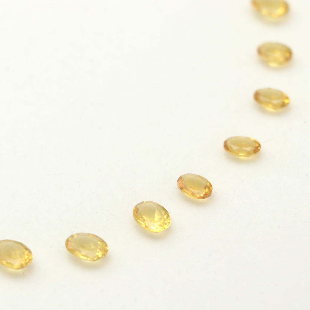 Natural Yellow Aquamarine Faceted Oval Loose Gemstone Layout, 5x7 mm to 9x11 mm, Aquamarine Oval Jewelry Making Gemstone, Set Of 21 Pieces - National Facets, Gemstone Manufacturer, Natural Gemstones, Gemstone Beads, Gemstone Carvings