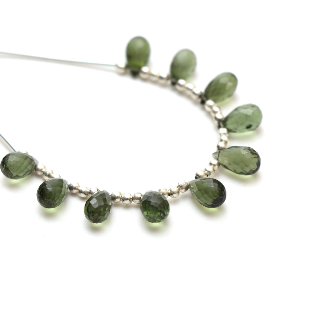 Natural Moldavite Faceted Drop Beads, 5.5x9 mm to 6x10.5 mm, Moldavite Drop Jewelry Making Beads, 3.5 Inch Full Strand, Price Per Strand - National Facets, Gemstone Manufacturer, Natural Gemstones, Gemstone Beads, Gemstone Carvings