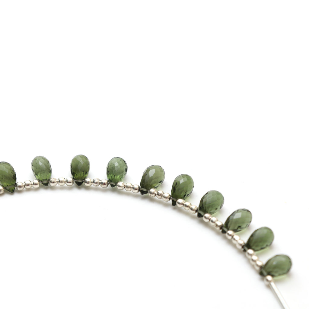 Natural Moldavite Faceted Drop Beads, 5.5x9 mm to 6x10.5 mm, Moldavite Drop Jewelry Making Beads, 3.5 Inch Full Strand, Price Per Strand - National Facets, Gemstone Manufacturer, Natural Gemstones, Gemstone Beads, Gemstone Carvings