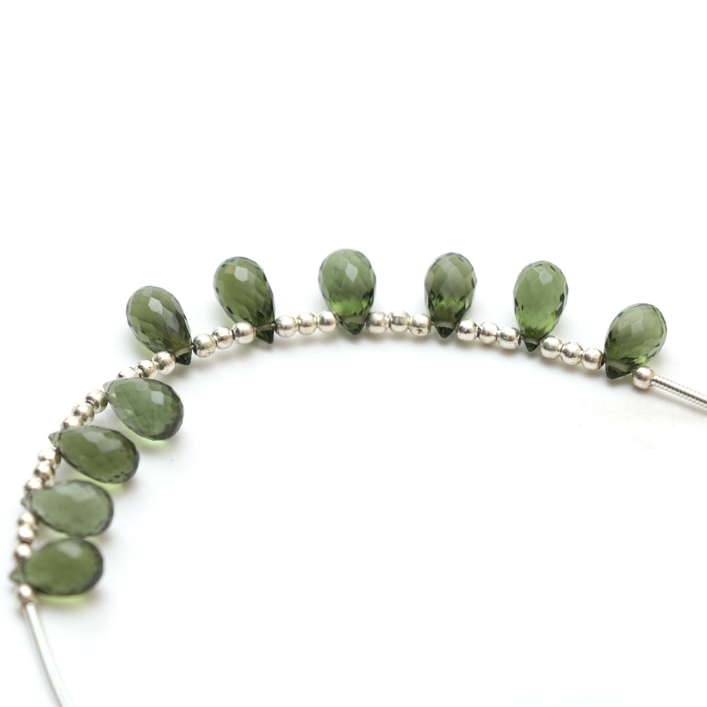 Natural Moldavite Faceted Drop Beads, 5.5x9 mm to 6x10.5 mm, Moldavite Drop Jewelry Making Beads, 3.5 Inch Full Strand, Price Per Strand - National Facets, Gemstone Manufacturer, Natural Gemstones, Gemstone Beads, Gemstone Carvings