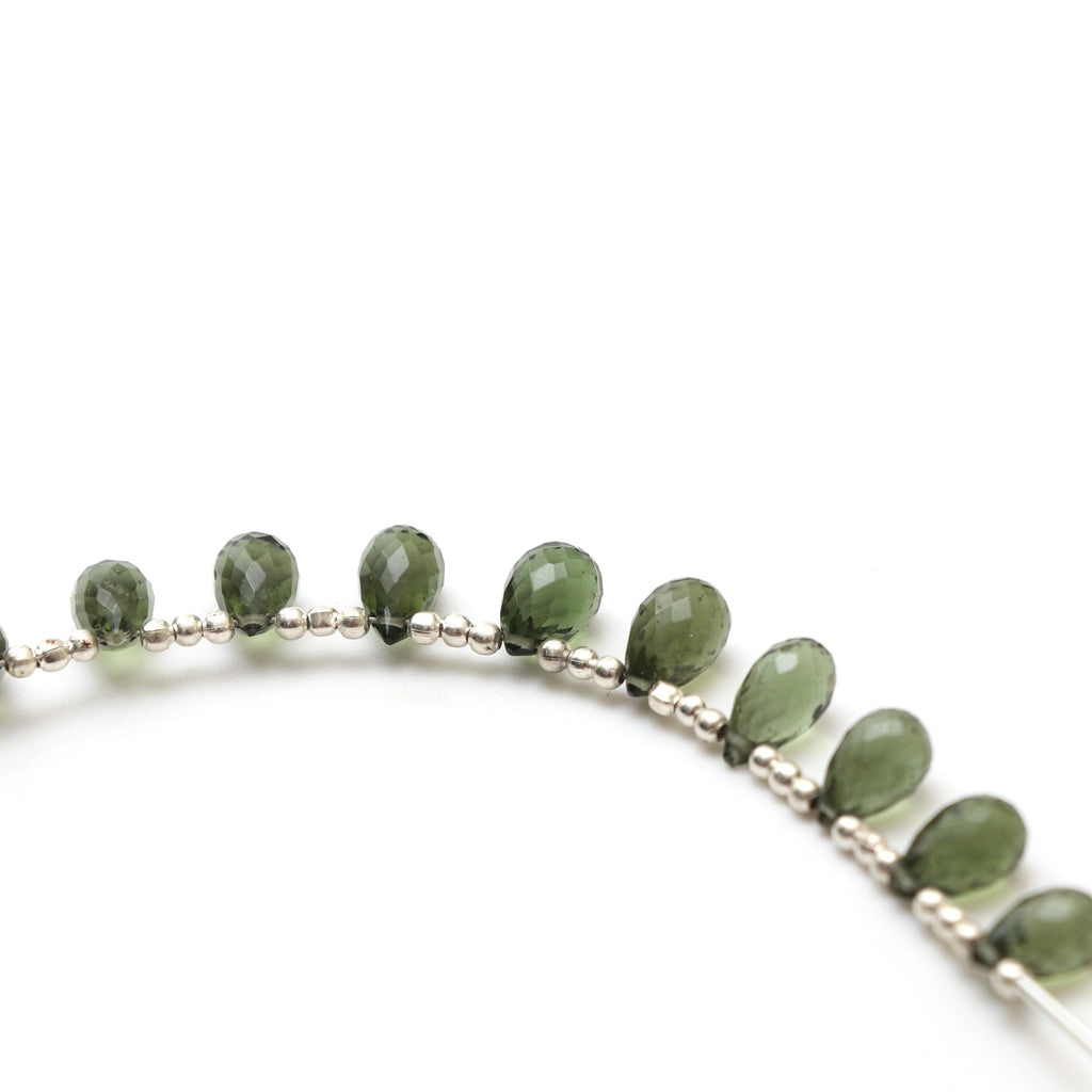 Natural Moldavite Faceted Drop Beads, 6x10 mm to 6.5x10 mm, Moldavite Drop Jewelry Making Beads, 3.5 Inch Full Strand, Price Per Strand - National Facets, Gemstone Manufacturer, Natural Gemstones, Gemstone Beads, Gemstone Carvings