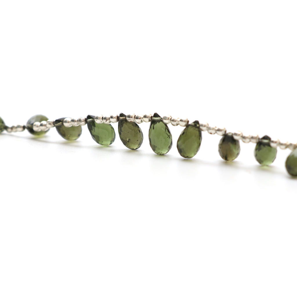 Natural Moldavite Faceted Drop Beads, 6x10 mm to 7x11.5 mm, Moldavite Drop Jewelry Making Beads, 3 Inch Full Strand, Price Per Strand - National Facets, Gemstone Manufacturer, Natural Gemstones, Gemstone Beads, Gemstone Carvings