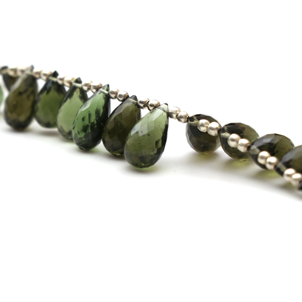 Natural Moldavite Faceted Drop Beads, 6.5x10 mm to 7x14 mm, Moldavite Drop Jewelry Making Beads, 11 cm, Full Strand, Price Per Strand - National Facets, Gemstone Manufacturer, Natural Gemstones, Gemstone Beads, Gemstone Carvings