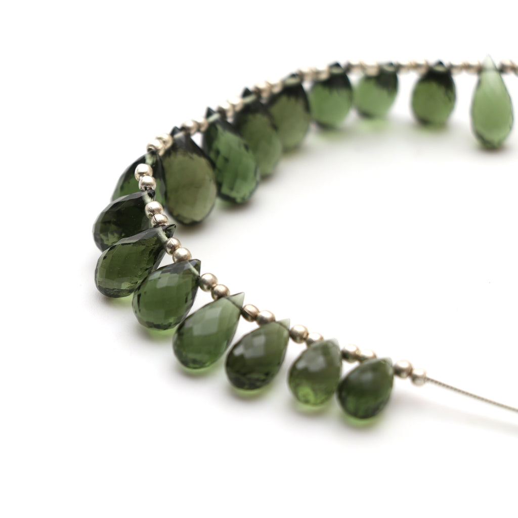 Natural Moldavite Faceted Drop Beads, 6.5x10.5 mm to 8x13.5 mm, Moldavite Drop Jewelry Making Beads, 4.5 Inch Full Strand, Price Per Strand - National Facets, Gemstone Manufacturer, Natural Gemstones, Gemstone Beads, Gemstone Carvings