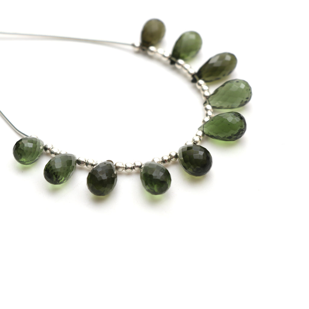 Natural Moldavite Faceted Drop Beads, 6.5x10 m to 6.5x13 mm, Moldavite Drop Jewelry Making Beads, 3.5 Inch Full Strand, Price Per Strand - National Facets, Gemstone Manufacturer, Natural Gemstones, Gemstone Beads, Gemstone Carvings