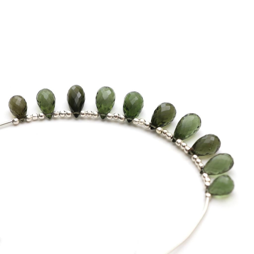 Natural Moldavite Faceted Drop Beads, 6.5x10 m to 6.5x13 mm, Moldavite Drop Jewelry Making Beads, 3.5 Inch Full Strand, Price Per Strand - National Facets, Gemstone Manufacturer, Natural Gemstones, Gemstone Beads, Gemstone Carvings