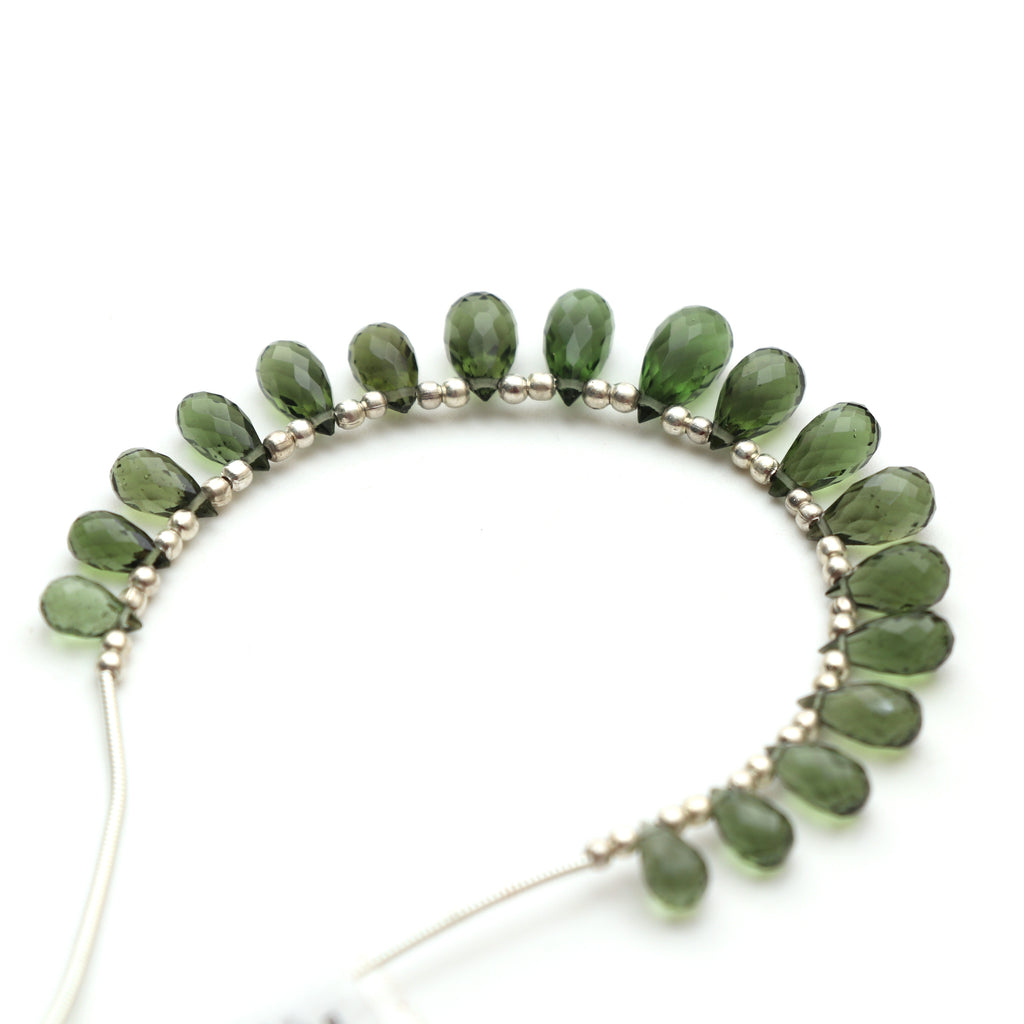 Natural Moldavite Faceted Drop Beads, 4.5x8 mm to 6x12 mm, Moldavite Drop Jewelry Making Beads, 12.5 Cm, Full Strand, Price Per Strand - National Facets, Gemstone Manufacturer, Natural Gemstones, Gemstone Beads, Gemstone Carvings