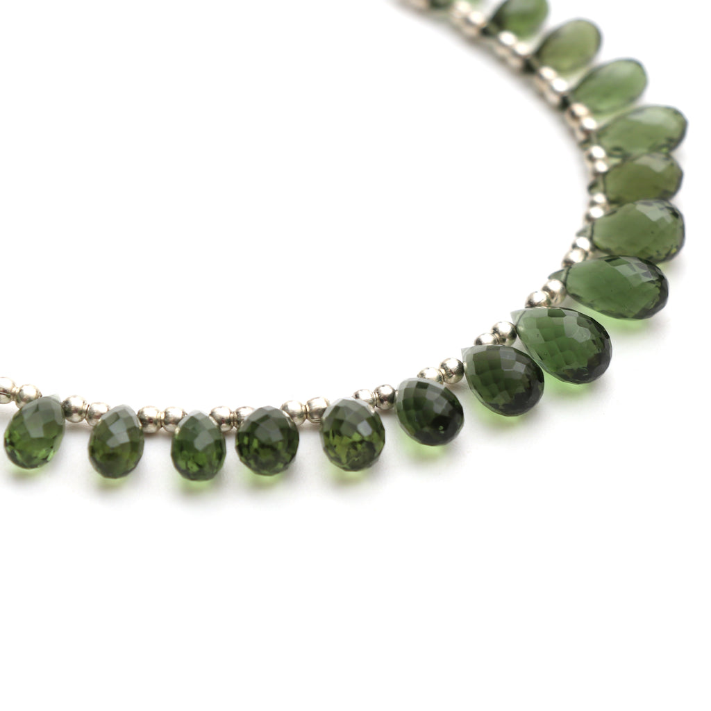 Natural Moldavite Faceted Drop Beads, 4.5x8 mm to 6x12 mm, Moldavite Drop Jewelry Making Beads, 12.5 Cm, Full Strand, Price Per Strand - National Facets, Gemstone Manufacturer, Natural Gemstones, Gemstone Beads, Gemstone Carvings
