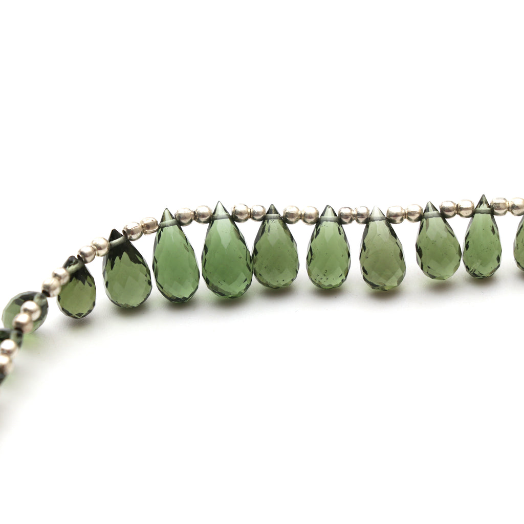 Natural Moldavite Faceted Drop Beads, 4.5x8 mm to 6x12 mm, Moldavite Drop Jewelry Making Beads, 12.5 Cm, Full Strand, Price Per Strand - National Facets, Gemstone Manufacturer, Natural Gemstones, Gemstone Beads, Gemstone Carvings