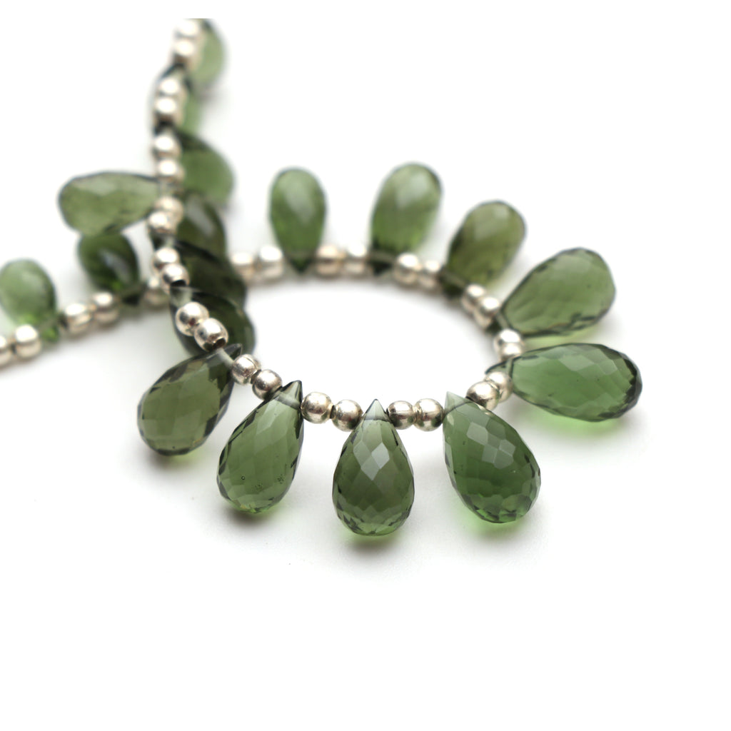 Natural Moldavite Faceted Drop Beads, 4.5x8 mm to 6x12 mm, Moldavite Drop Jewelry Making Beads, 12.5 Cm, Full Strand, Price Per Strand - National Facets, Gemstone Manufacturer, Natural Gemstones, Gemstone Beads, Gemstone Carvings