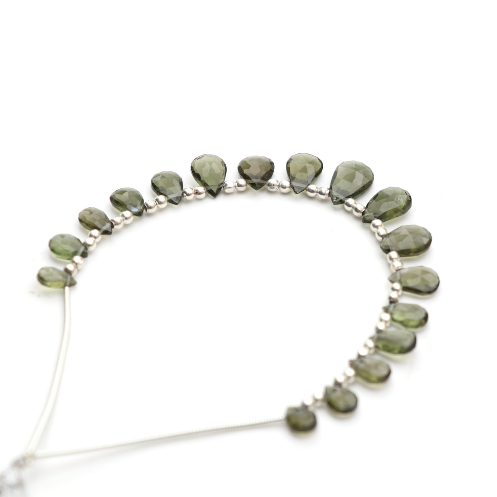 Natural Moldavite Faceted Pear Beads, 4.5x7 mm to 7.5x12 mm, Moldavite Jewelry Making Gemstone, 5 Inch Full Strand, Price Per Strand - National Facets, Gemstone Manufacturer, Natural Gemstones, Gemstone Beads, Gemstone Carvings