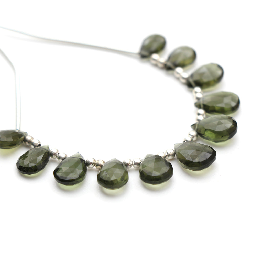 Natural Moldavite Faceted Pear Beads, 7x9 mm to 8x12 mm, Moldavite Jewelry Making Gemstone, 3.5 Inch Full Strand, Price Per Strand - National Facets, Gemstone Manufacturer, Natural Gemstones, Gemstone Beads, Gemstone Carvings