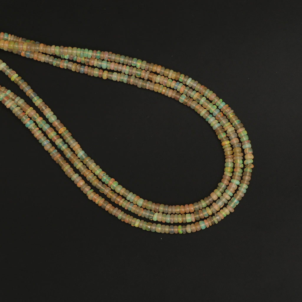 Natural Honey Ethiopian Opal Smooth Roundel Beads, 3mm To 4mm, Ethiopian Opal Beads, Gem Quality, 16 Inch Full Strand, Price Per Strand - National Facets, Gemstone Manufacturer, Natural Gemstones, Gemstone Beads, Gemstone Carvings