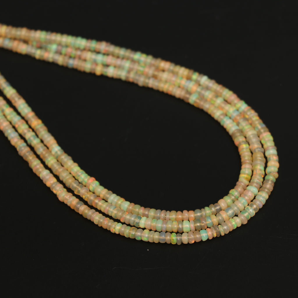 Natural Honey Ethiopian Opal Smooth Roundel Beads, 3mm To 4mm, Ethiopian Opal Beads, Gem Quality, 16 Inch Full Strand, Price Per Strand - National Facets, Gemstone Manufacturer, Natural Gemstones, Gemstone Beads, Gemstone Carvings