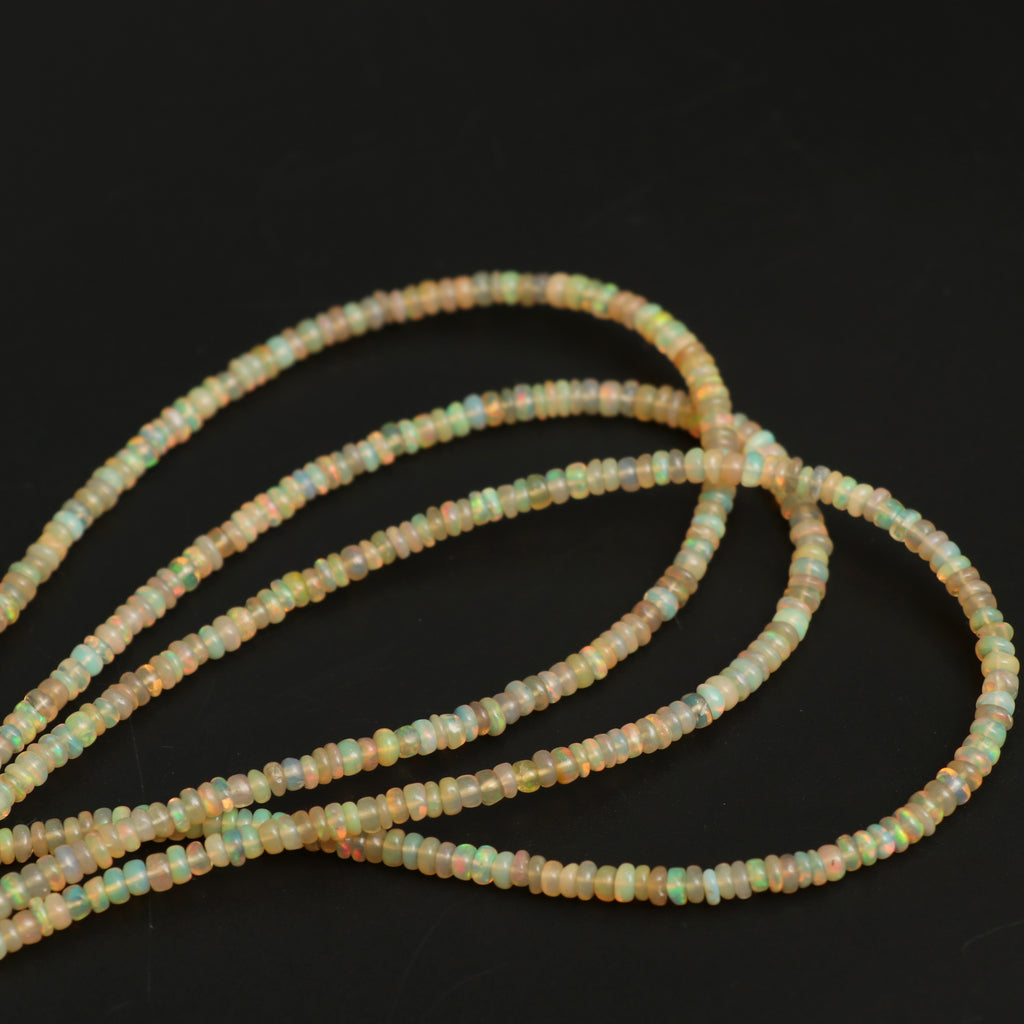 Natural Honey Ethiopian Opal Smooth Roundel Beads, 3mm To 4mm, Ethiopian Opal Beads, Gem Quality, 16 Inch Full Strand, Price Per Strand - National Facets, Gemstone Manufacturer, Natural Gemstones, Gemstone Beads, Gemstone Carvings