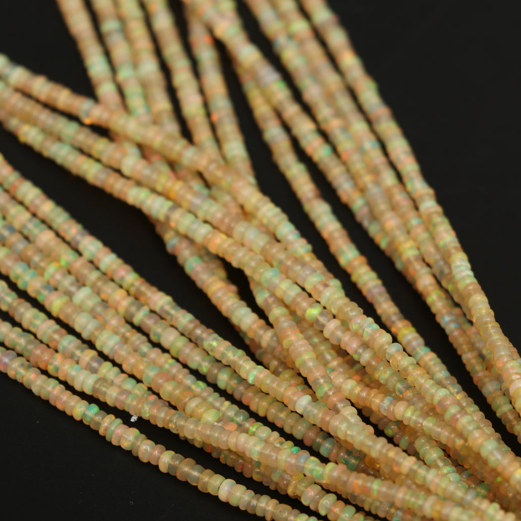 Natural Honey Ethiopian Opal Smooth Roundel Beads, 3mm To 4mm, Ethiopian Opal Beads, Gem Quality, 16 Inch Full Strand, Price Per Strand - National Facets, Gemstone Manufacturer, Natural Gemstones, Gemstone Beads, Gemstone Carvings